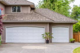 Garage Door’s Broken Springs: What Causes It?
